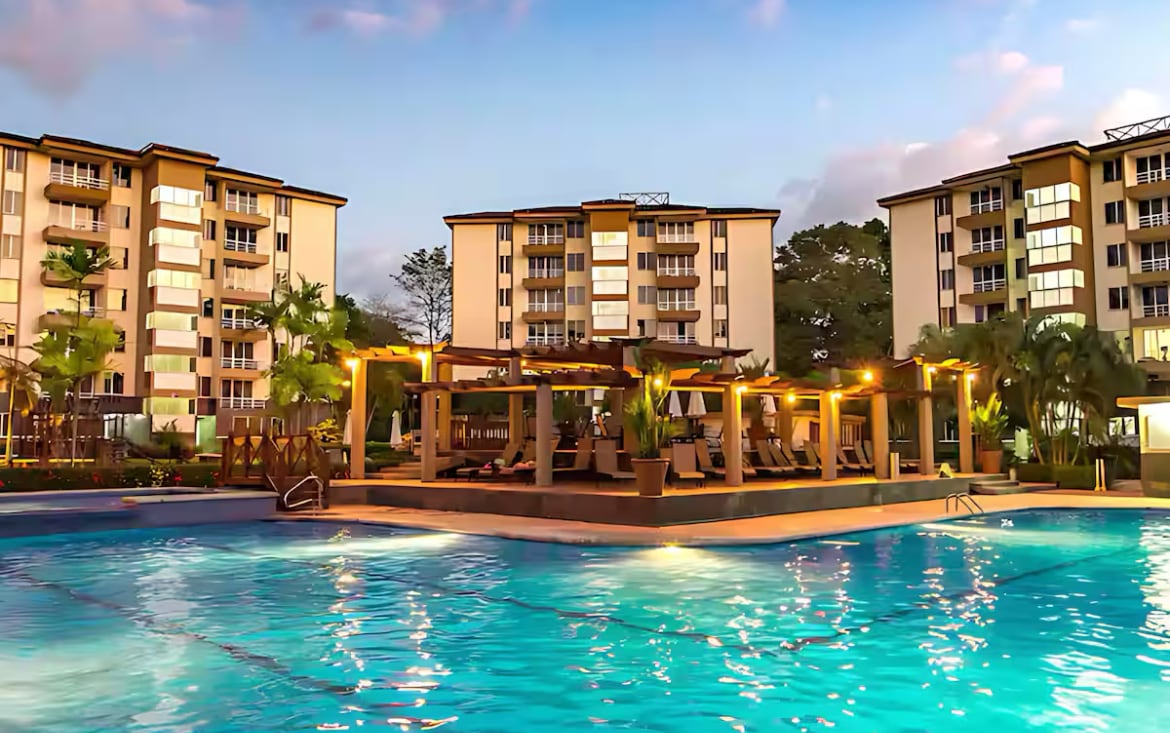 Costa Linda Resort pool at dusk - Jaco Retreat Costa Rica